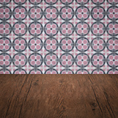 Image showing Wood table top and blur vintage ceramic tile pattern wall