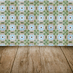 Image showing Wood table top and blur vintage ceramic tile pattern wall