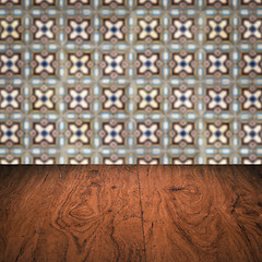 Image showing Wood table top and blur vintage ceramic tile pattern wall