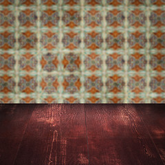 Image showing Wood table top and blur vintage ceramic tile pattern wall