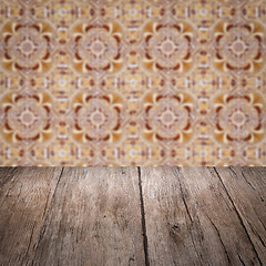 Image showing Wood table top and blur vintage ceramic tile pattern wall