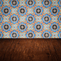 Image showing Wood table top and blur vintage ceramic tile pattern wall