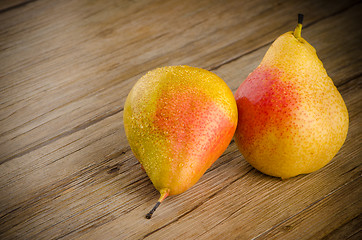 Image showing Pears in a old wooden table