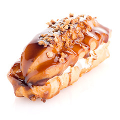 Image showing Eclair with caramel decoration