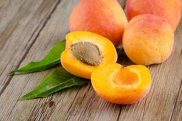 Image showing Apricots with leaves
