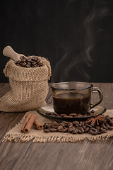 Image showing Coffee cup with burlap sack