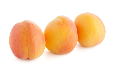 Image showing Three sweet peaches