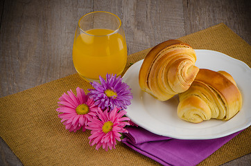 Image showing Croissants with orange juice 
