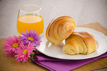 Image showing Croissants with orange juice 