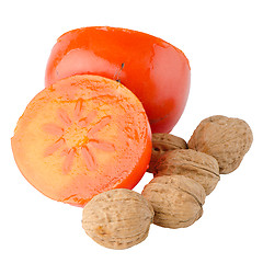 Image showing Ripe persimmons and nuts