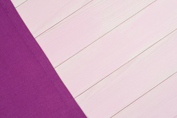 Image showing Purple towel over wooden table