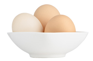 Image showing Brown eggs in white ceramic bowl