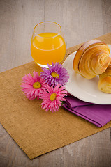 Image showing Croissants with orange juice 