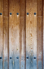 Image showing Weathered wooden door texture background 