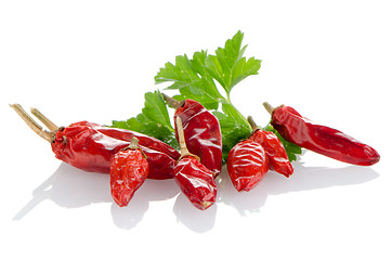 Image showing Red chili or chilli pepper and parsley leaves