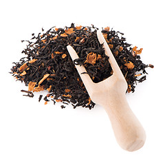 Image showing Black Dry Tea with a Wooden Spoon