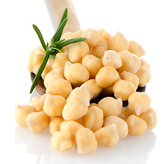 Image showing Chickpeas over wooden spoon