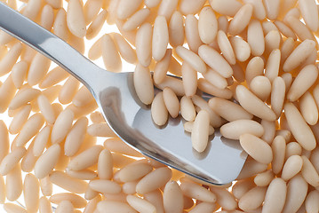 Image showing Pine nuts and spoon