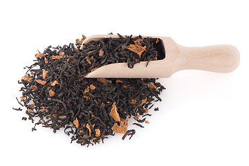 Image showing Black Dry Tea with a Wooden Spoon