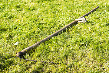 Image showing Scythe is old agricultural tools for mowing grass