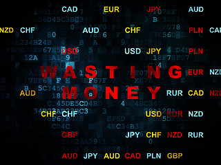 Image showing Currency concept: Wasting Money on Digital background