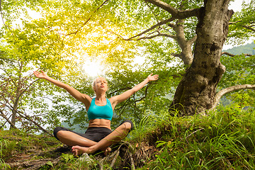 Image showing Woman relaxing in beautiful nature.