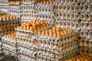 Image showing Enormous Stack of Egg Trays at an Asian Public Market