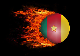 Image showing Flag with a trail of fire - Cameroon