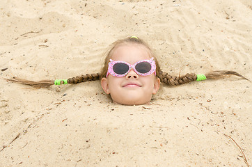 Image showing Five-year girl with glasses on the beach