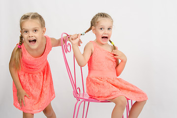 Image showing Two girls having fun and shout