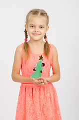 Image showing Happy girl Christmas tree made of cardboard