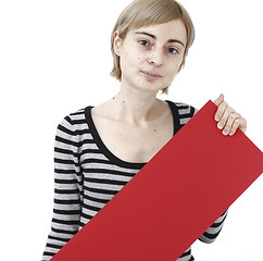 Image showing Woman holding a paper