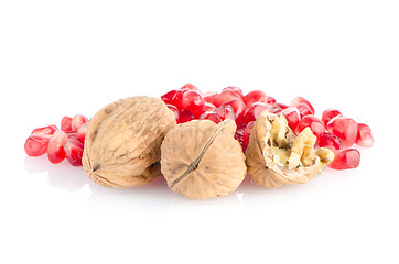 Image showing Pomegranate seed pile and nuts