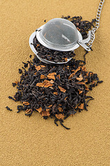 Image showing Black dry tea with petals