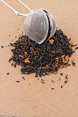 Image showing Black dry tea with petals