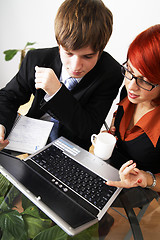 Image showing beautiful caucasian business woman with young consultant