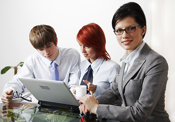 Image showing beautiful caucasian business women with young consultant