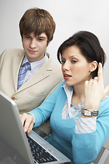 Image showing beautiful caucasian business woman with young consultant