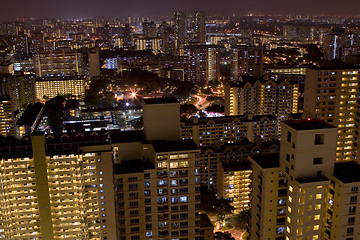 Image showing Skyline of Singapore suburbs at night

