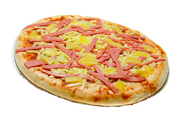 Image showing Uncooked ham and pineapple pizza


