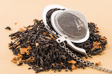 Image showing Black dry tea with petals