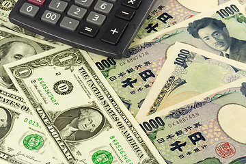 Image showing Forex - US and Japanese currency pair with calculator

