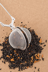 Image showing Black dry tea with petals