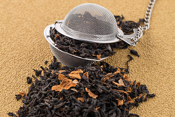 Image showing Black dry tea with petals