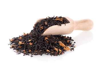 Image showing Black Dry Tea with a Wooden Spoon