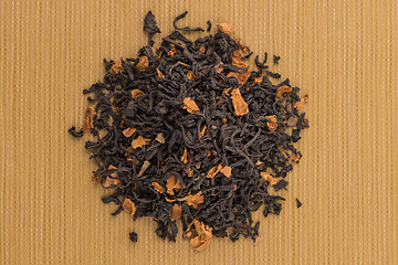 Image showing Black dry tea with petals