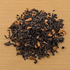 Image showing Black dry tea with petals