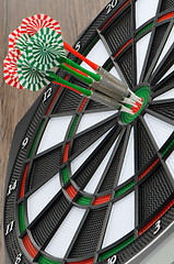 Image showing Dart board with darts