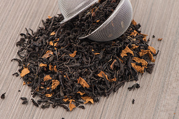 Image showing Black dry tea with petals