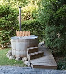 Image showing Wooden hot tub in the alps